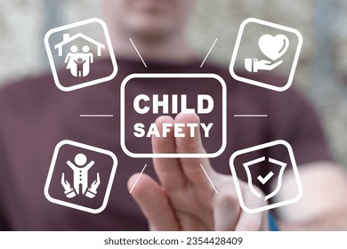Man using virtual touch screen presses inscription: CHILD SAFETY. Concept of International Children's Day. Child safety, assistance care, support and protection.