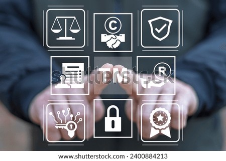 Man using virtual touch screen presses abbreviation: TM. Trademark ( TM ) copyright or patent business industry technology concept. Trade mark protection. Reistered and unregistered service trademark.