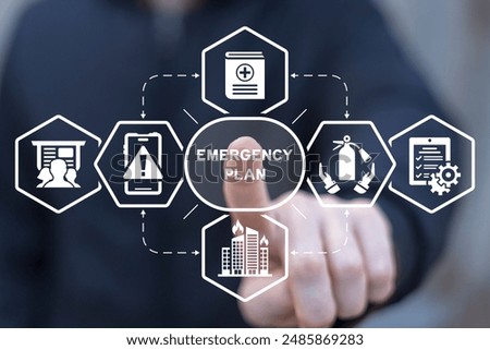 Man using virtual touch screen clicks inscription: EMERGENCY PLAN. Business emergency plan concept. Checklist to do in disaster, continue business and build resilience concept. Smart emergency plan.
