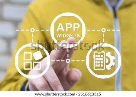 Man using virtual touch screen presses inscription: APP WIDGETS. App widget web mobile computer technology concept. Widgets apps.
