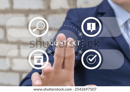 Man using virtual touch screen presses word: CONTEXT. Context business education concept. Context analytic and learning.