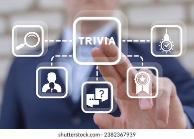 Man using virtual touchscreen presses word: TRIVIA. Business, Finance and Economics concept. Trivia Time.