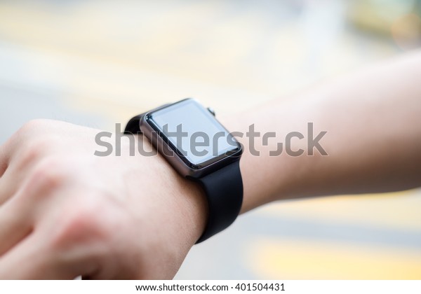 Man using wearable smart\
watch
