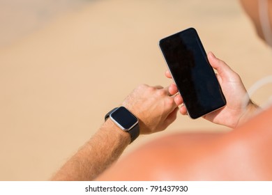 Man using wearable tech during workout