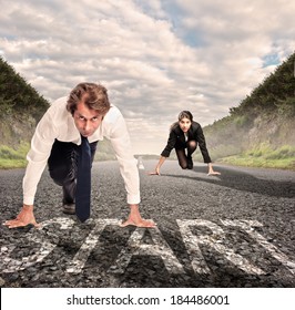 Man Versus Woman On A Road Ready To Run