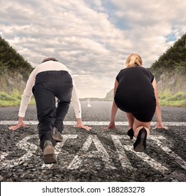 Man Versus Woman On A Road Ready To Run