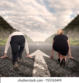 Man Versus Woman On A Road With Arrow Painted On It