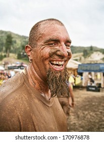 A Man With A Very Muddy Face