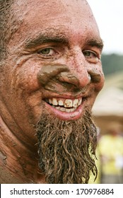 A Man With A Very Muddy Face