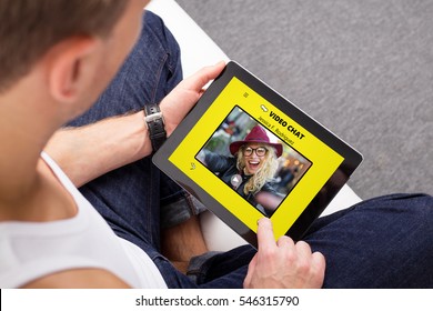 Man video chatting with girlfriend