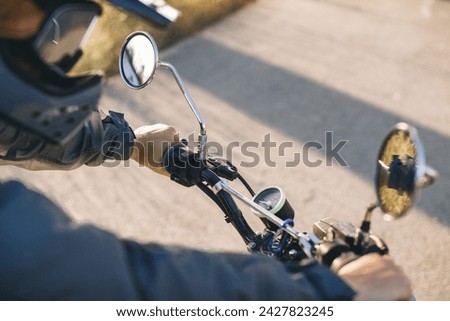 Similar – Senior man repairing damaged motorcycle engine