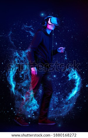 Man with virtual reality headset. Elements of this image furnished by NASA. Concept of virtual reality, games, entertainment and communication.