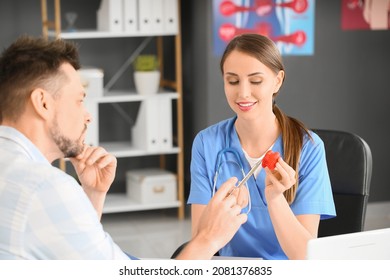 Man Visiting Endocrinologist In Clinic