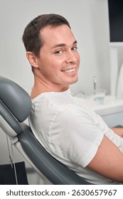 Man visiting stomatologist to detect problems at their earliest stages
