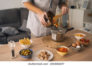 Man With Vitiligo Making Pasta For A Salad