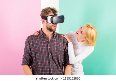 Man VR Glasses Enjoy Video Game. Girl Happy He Like Her Gift. Gift Ideas For Men. Make Him Happy Gift Him Virtual Reality Glasses And Let Play Games All Day. Best Gift Ever. Man Enjoy Virtual Reality.