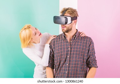 Man VR Glasses Enjoy Video Game. Girl Happy He Like Her Gift. Gift Ideas For Men. Make Him Happy Gift Him Virtual Reality Glasses And Let Play Games All Day. Best Gift Ever. Man Enjoy Virtual Reality.