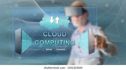 Man with vr headset touching a cloud computing concept on a touch screen with his finger