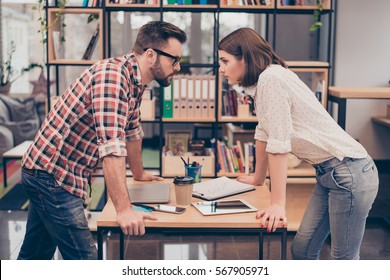 Man Vs Woman. Two Concentrated  Business Partners Quarreling.