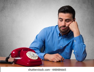 Man Waiting For A Phone Call