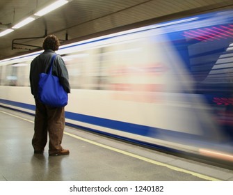 a man waiting for the train