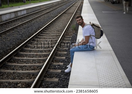 Similar – man traveling in train carriage