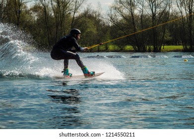 Man wake boarding on a lake