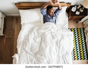 Man waking up in the morning
