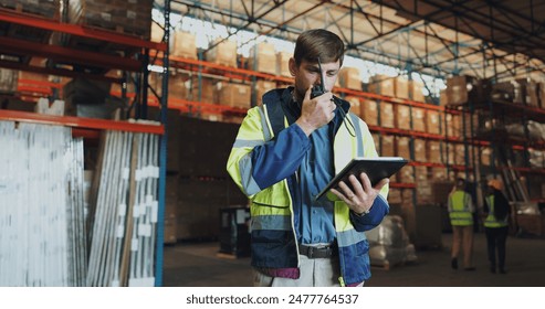 Man, walkie talkie and tablet in factory for communication, orders or check inventory or stock. Male worker, digital technology or contact in shipping company for export, distribution or supply chain