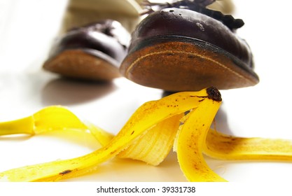 Man Walking, About To Step On A Banana Peel