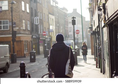 Man Walking In Backlit Shoreditch