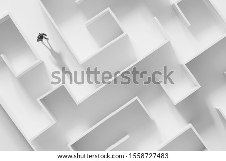 man walking in a complex white maze, surreal concept