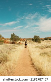 Man Walking Into The Outback Bush.