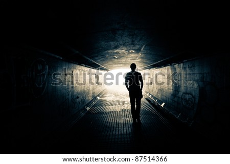 Man walking to the light