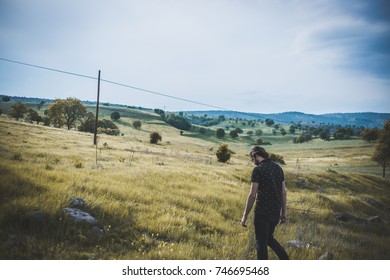 Man Walking Meadow Stock Photo 746695468 | Shutterstock