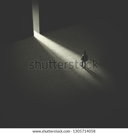 man walking in the night following light, open door concept