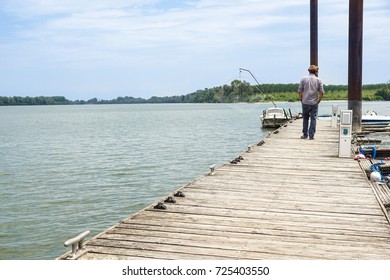 Man Walking On Dock Away Camera Stock Photo 725403550 | Shutterstock