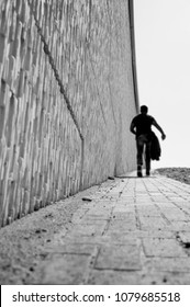 A man walking a path