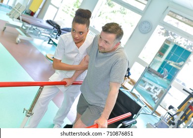 Man Walking In A Rehabilitation Center