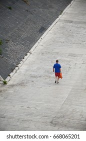 man walking in solitude