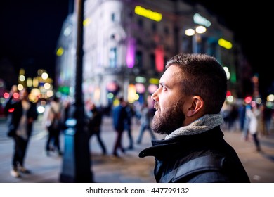 Man Walking In The Streets Of London At Night