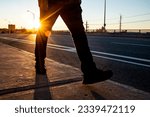 Man walking in sunrise in Toronto 