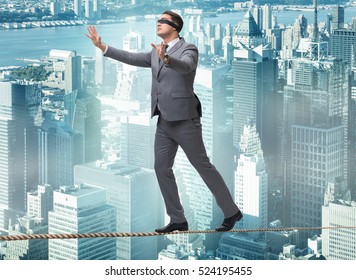 Man Walking In Tight Rope Blindfold