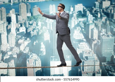 Man Walking In Tight Rope Blindfold