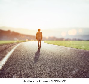 Man walks on an unknown road for a new adventure