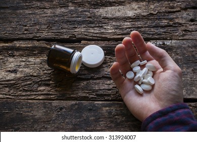 man wants to commit suicide by eating pills