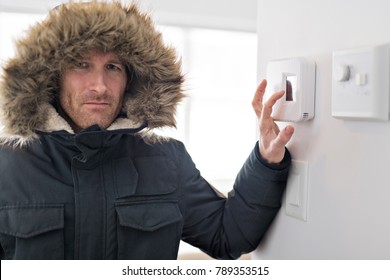 Man With Warm Clothing Feeling The Cold Inside House