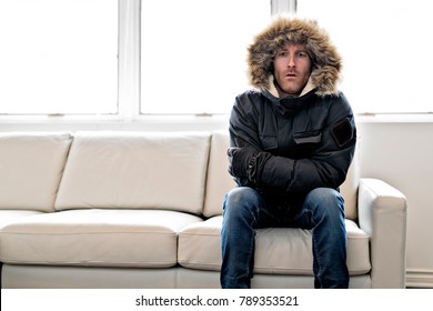 Man With Warm Clothing Feeling The Cold Inside House On The Sofa