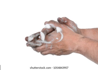 Man washing dirty greasy hands with soap white background