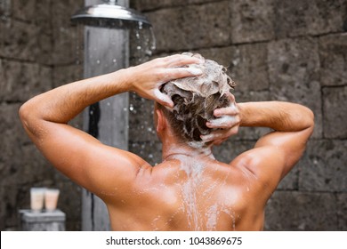 Man Washing Head With Shampoo